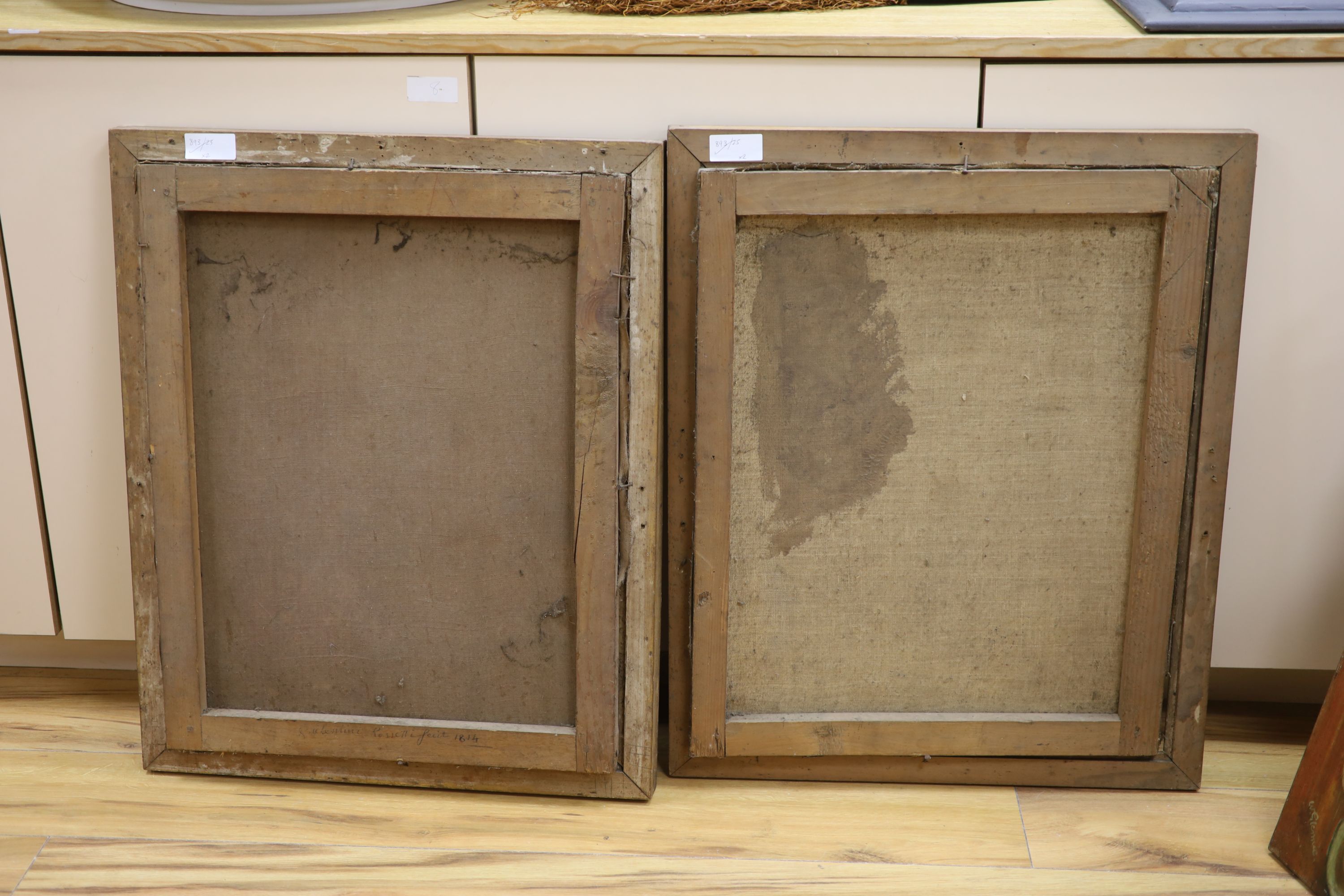 Early 19th century French School, an associated pair of portrait studies of gentleman, each wearing medals, indistinctly signed, one marked verso, 60 x 47cm.